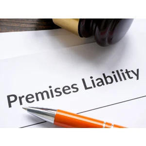 Premises liability documents beside a judge’s gavel